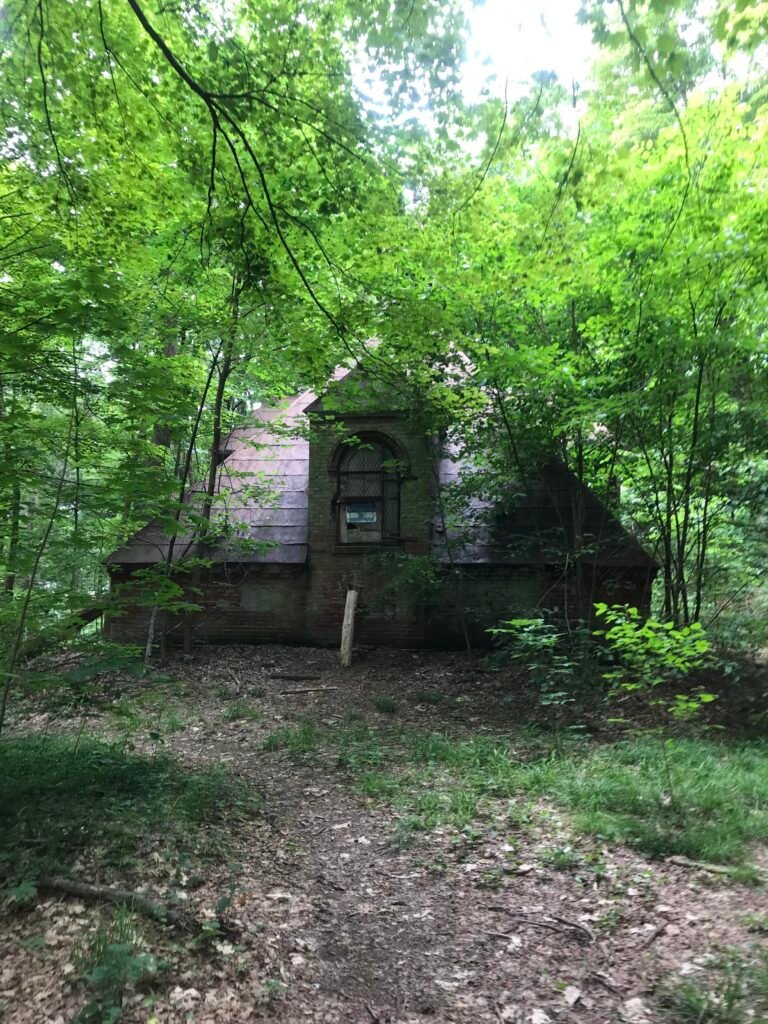 Came across this abandoned building in Vermont while hiking in the woods. There’s no door and the windows have been boarded up and caged
